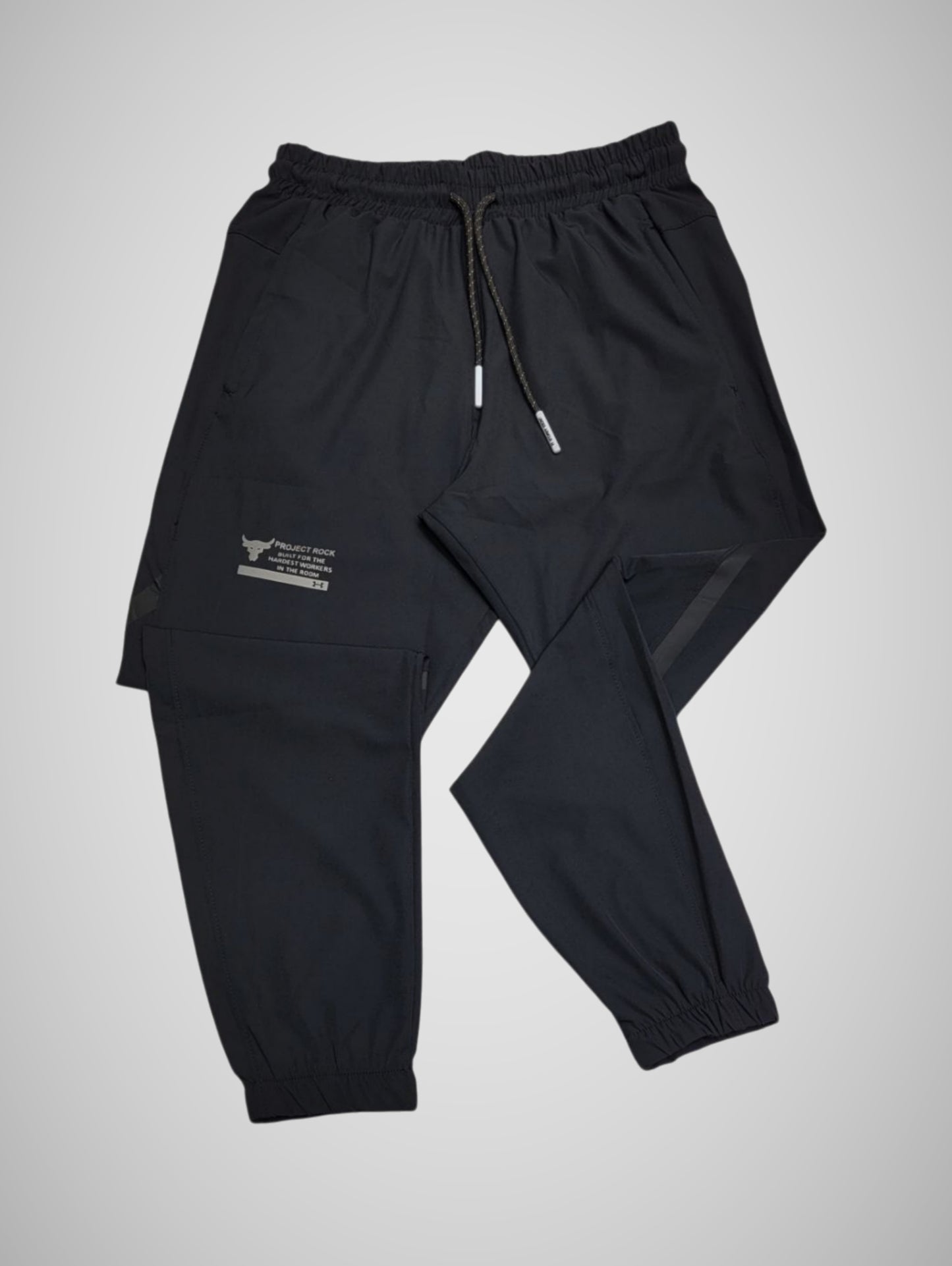PROJECT ROCK PARACHUTE PANTS