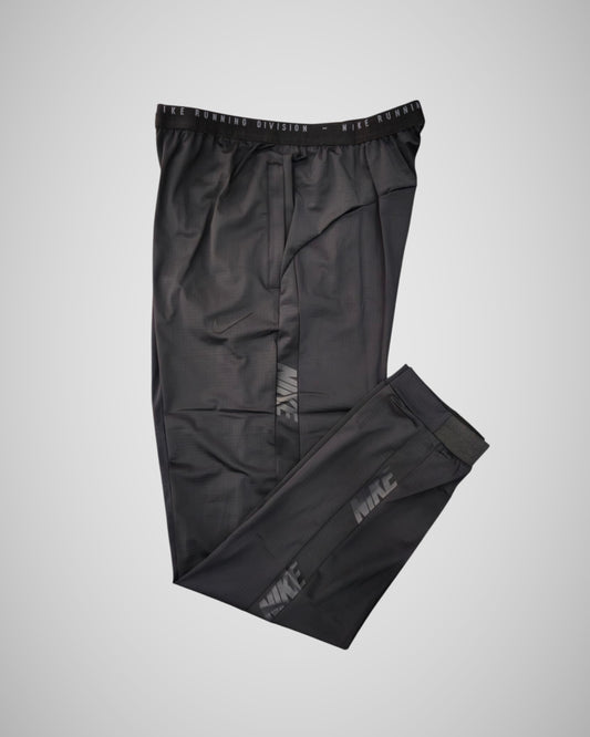 NIKE DRI-FIT PARACHUTE PANTS